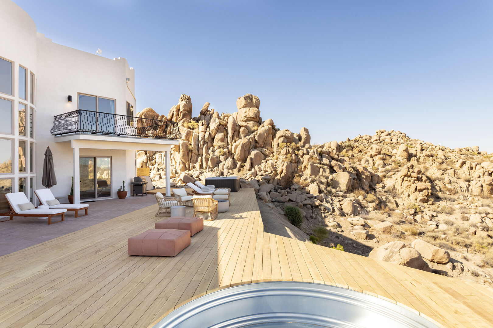 Casa Blanca’s deck overlooking the desert and boulders
