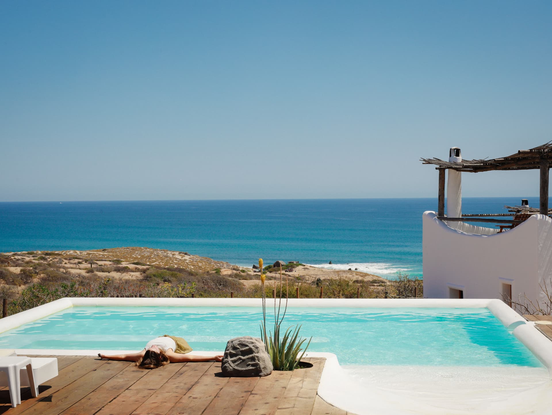 An infinity pool overlooking the blue Baja coastline