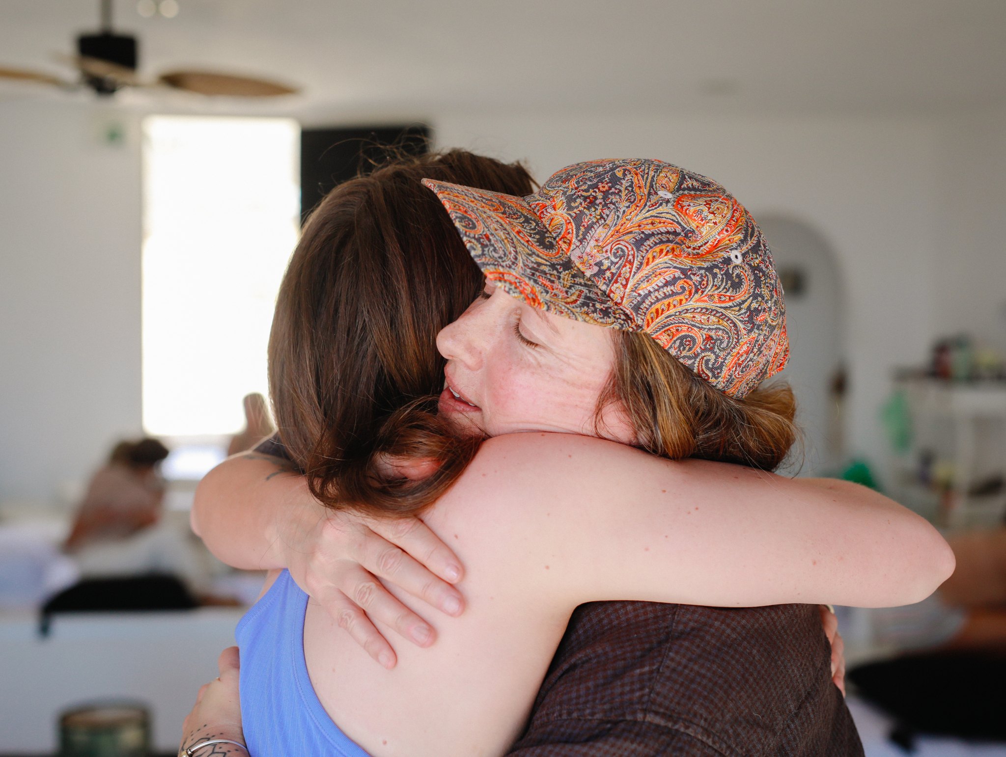 Two women sharing a close embrace